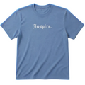 Blue t-shirt with 'Inspire.' text on a white background