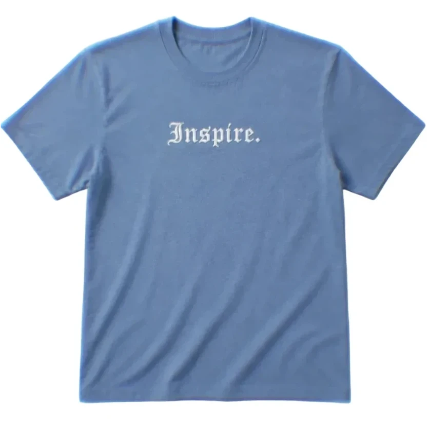 Blue t-shirt with 'Inspire.' text on a white background